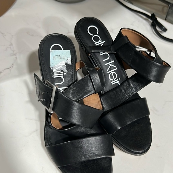 Calvin Klein Shoes - Calvin Klein black strapped wedges size 7.5